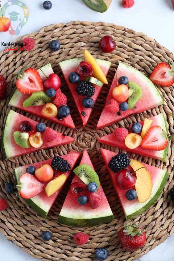 تزیین میز شب یلدایی با میوه و شیرینی و اجیل